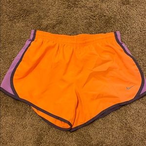 Orange Nike shorts